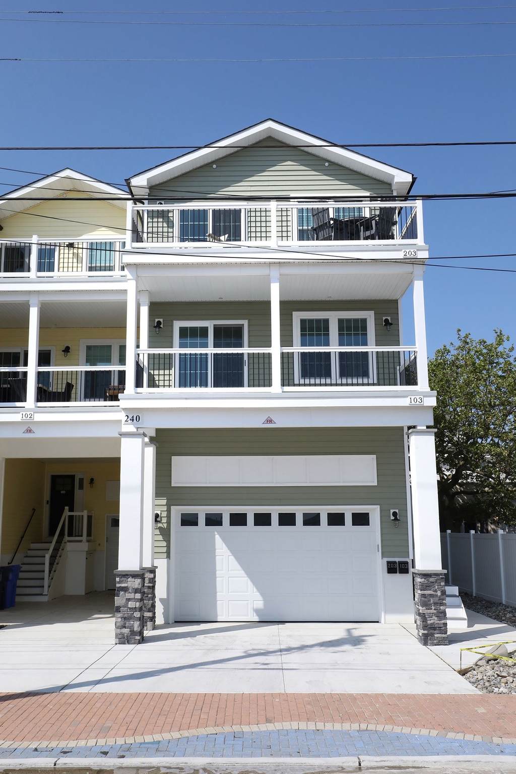 Top Floor Condo with shared garage (2 total parking spaces one inside and one outside) 