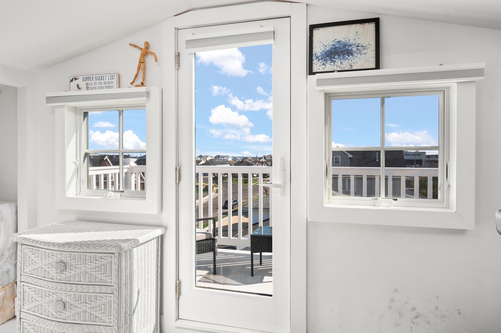 Deck off the top floor with a little ocean view and lake Louise views