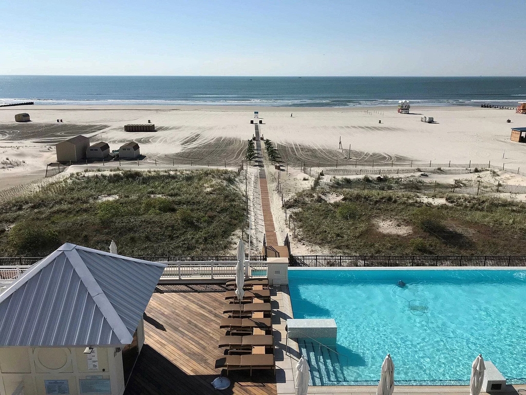 pool or walk to the beach - chairs and umbrellas provided on the beach