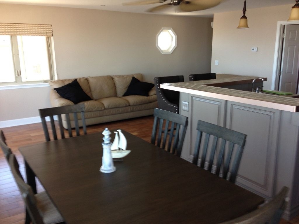 Kitchen, Dining and Seating Area in Front of Condo
