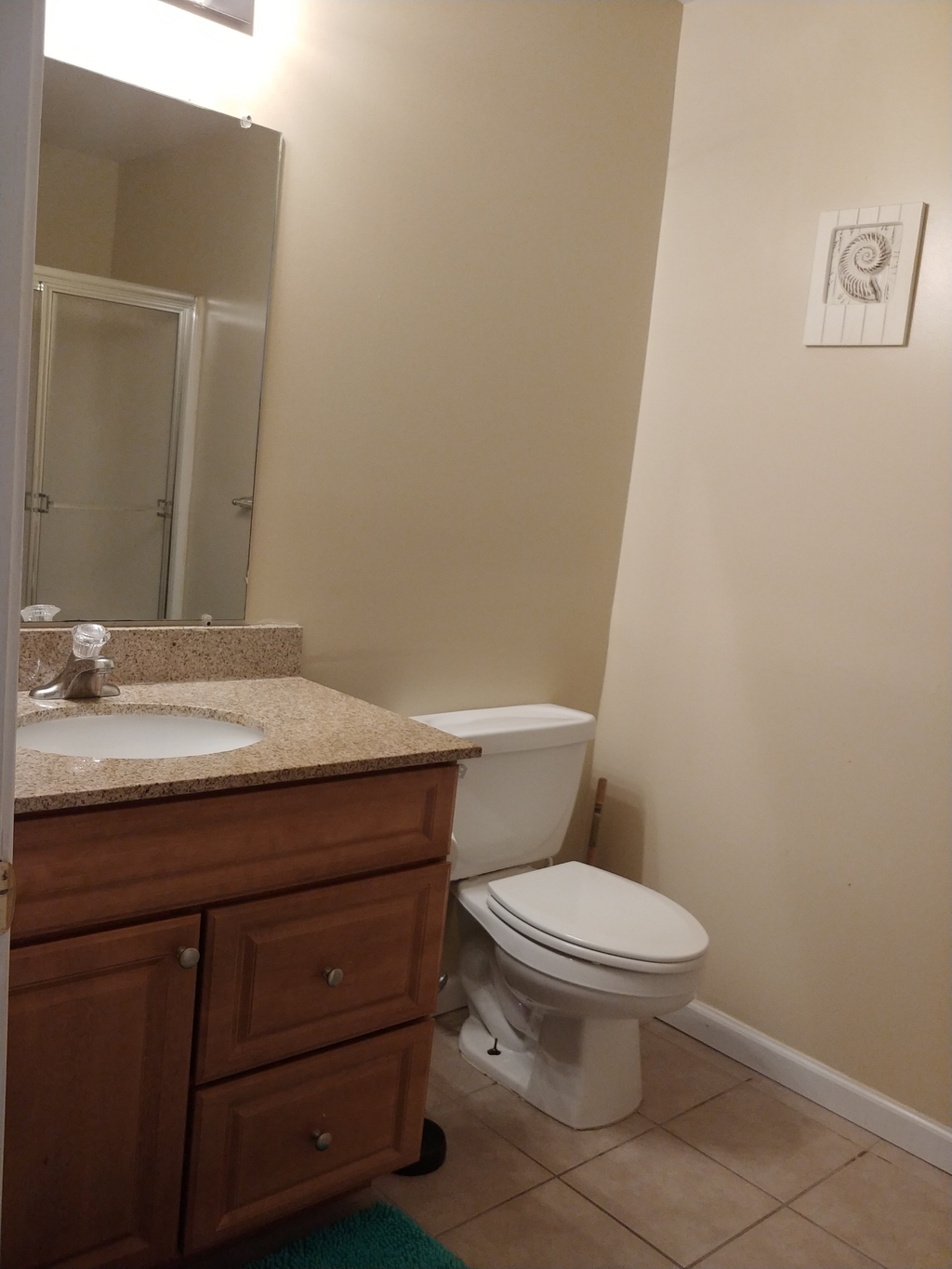 Downstairs full bath with stall shower.