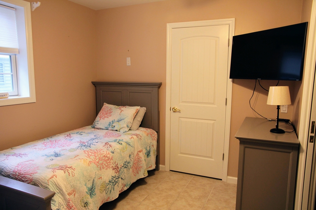 1st floor bedroom - 2 twin beds and twin trundle bed