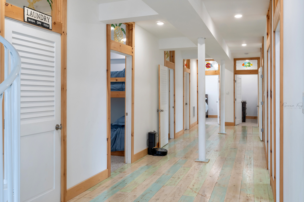 Alternate view of second floor hallway with 7 bedrooms