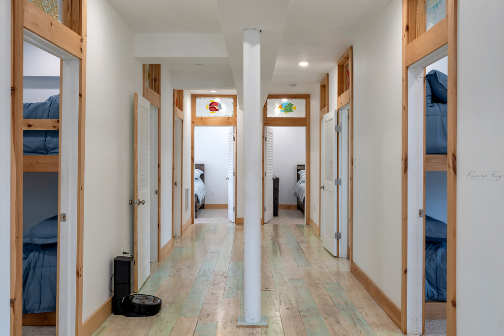 Second floor hallway to 7 bedrooms