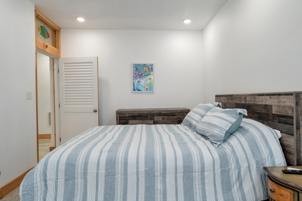 Alternate view of queen bedroom with ensuite bathroom