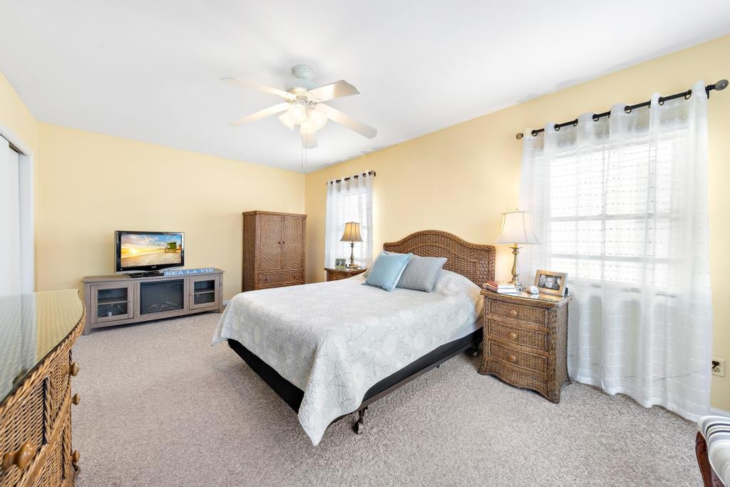 Master bedroom with fire element and plenty of drawer space.