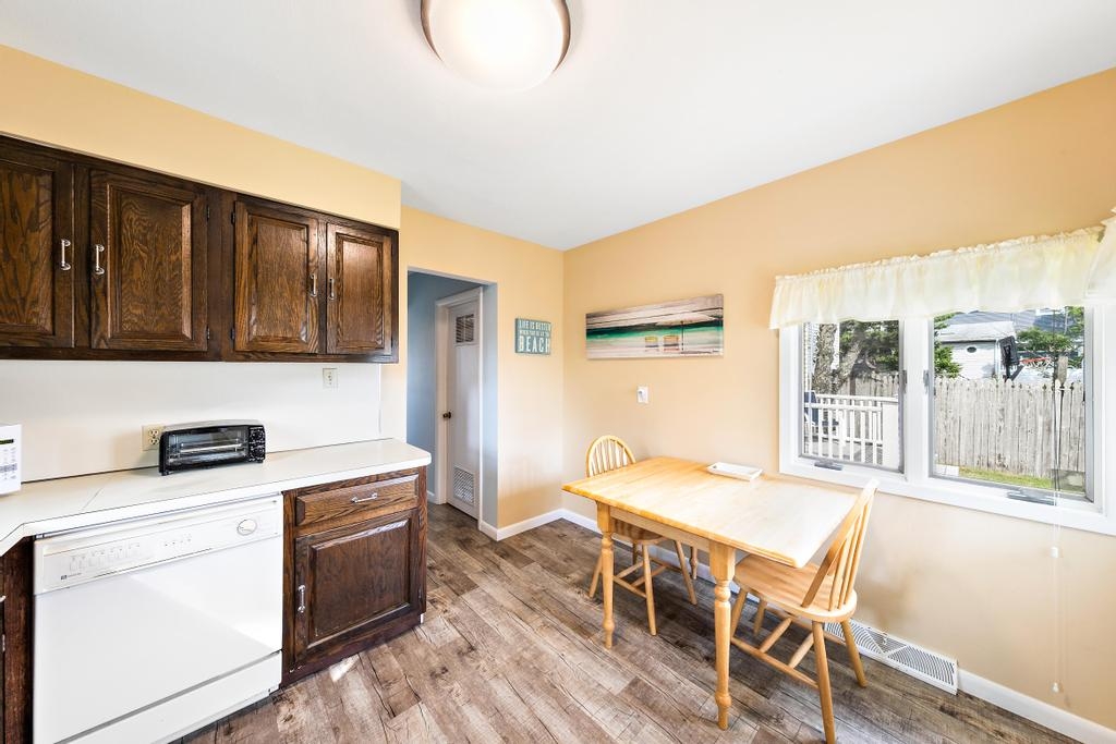Kitchen with eat-in table with fold down table flaps. 
