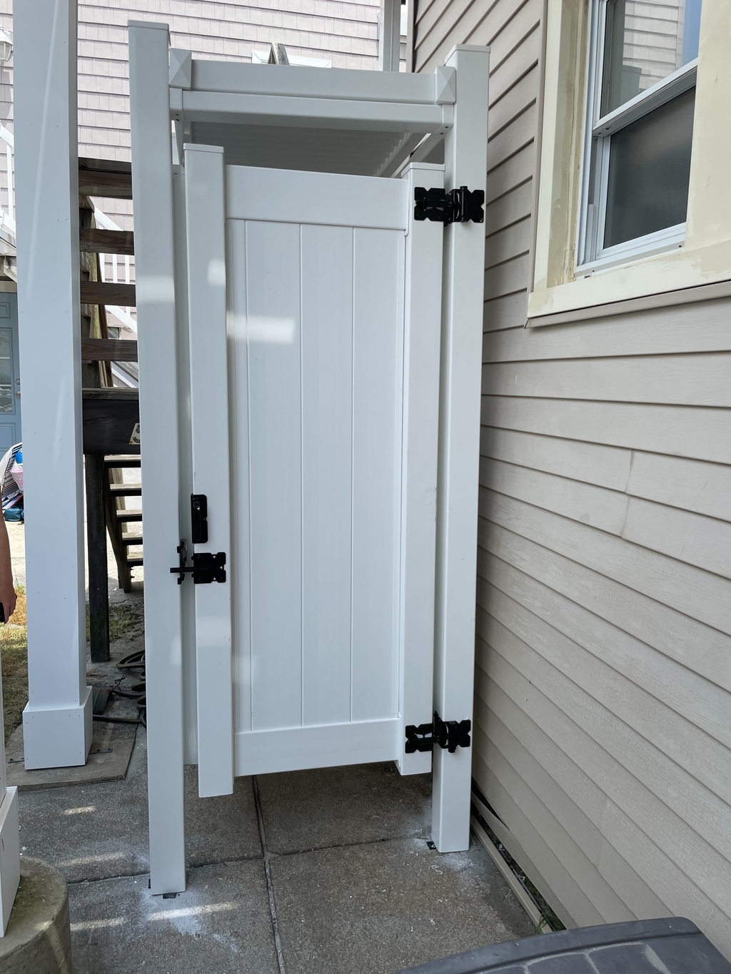 Enclosed outdoor shower.