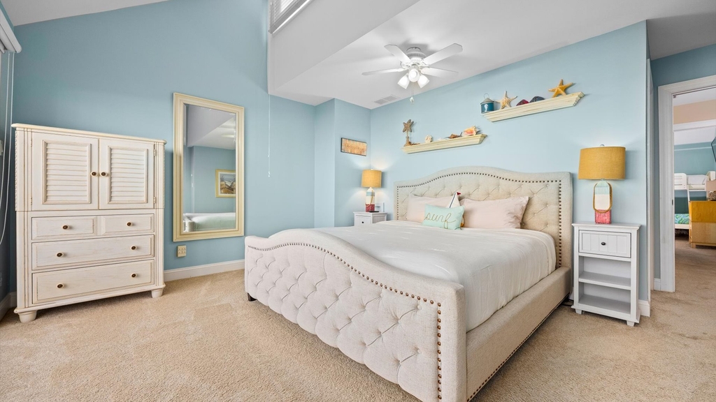 King master bedroom with private bathroom and balcony on top level