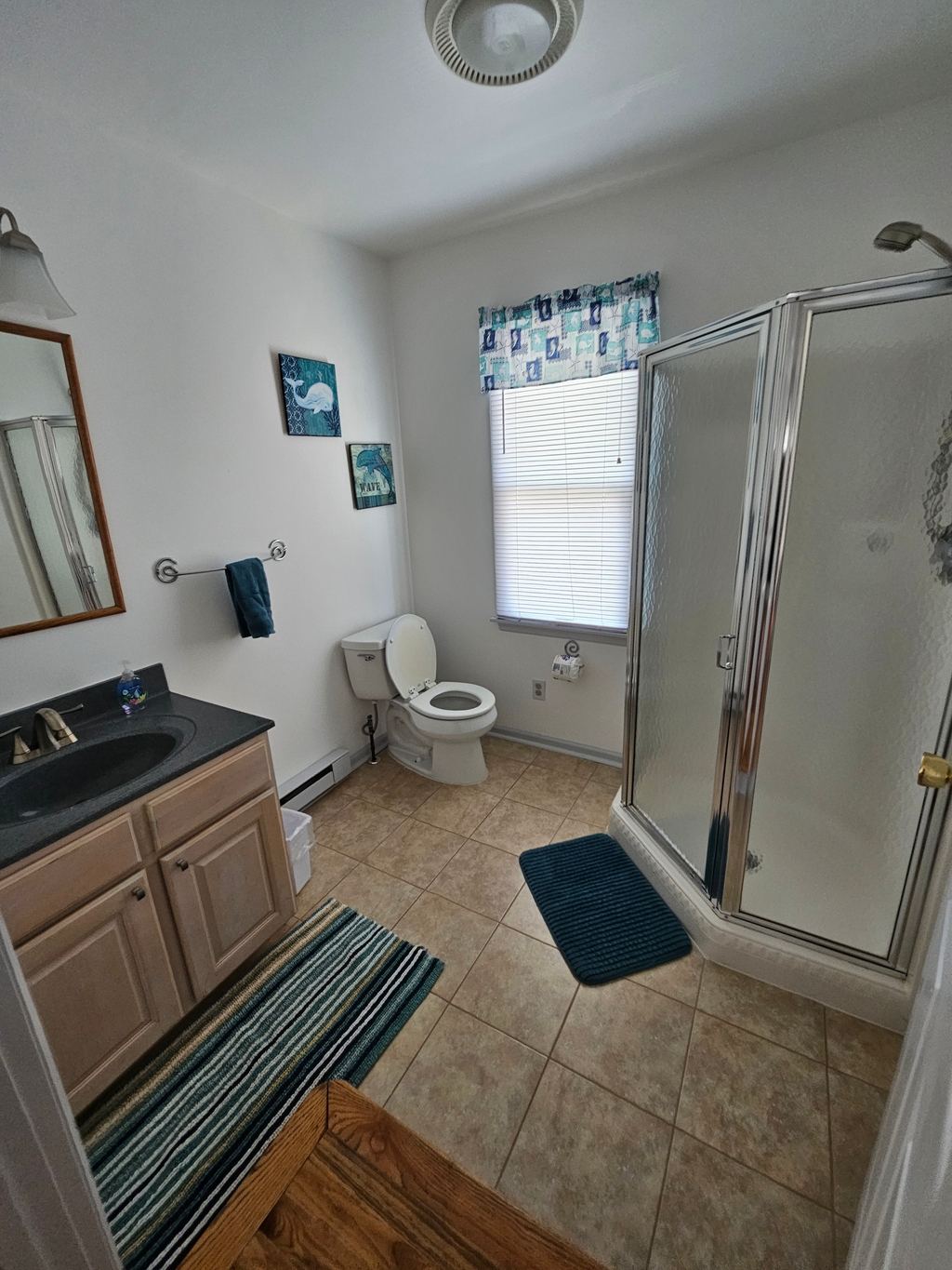 2nd fl. ensuite bathroom (connected to bedroom with queen bed)
