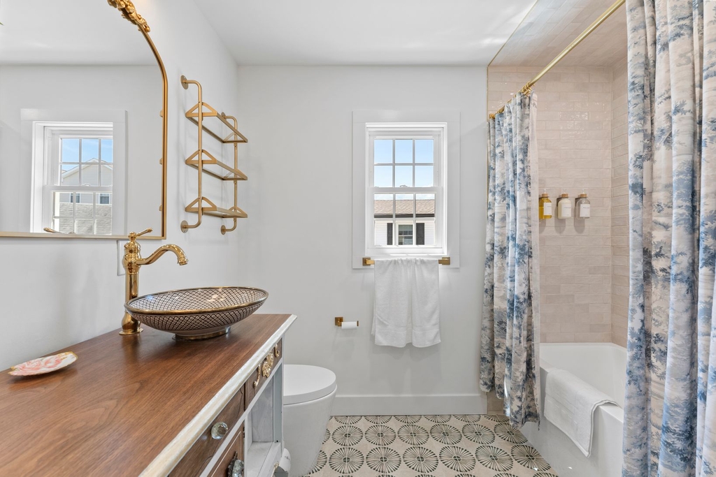 Full bathroom with bathtub