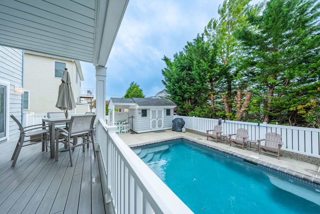 Relax and unwind by the private heated pool