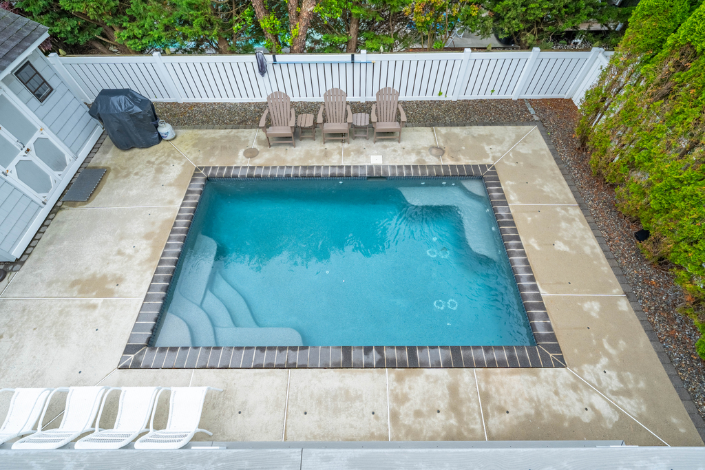 Relax and unwind by the private heated pool