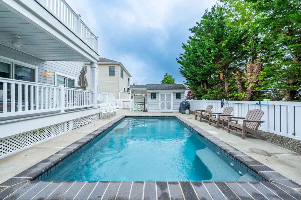 Relax and unwind by the private heated pool
