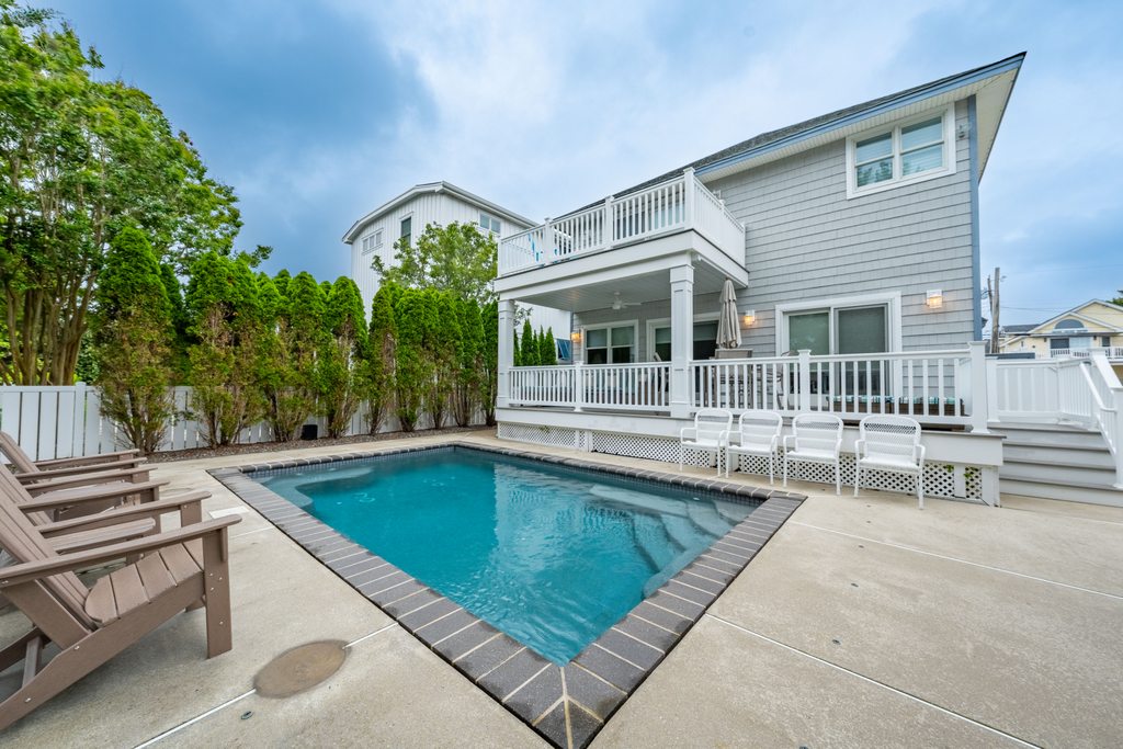 Relax and unwind by the private heated pool