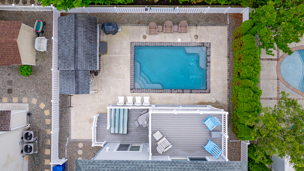 Relax and unwind by the private heated pool