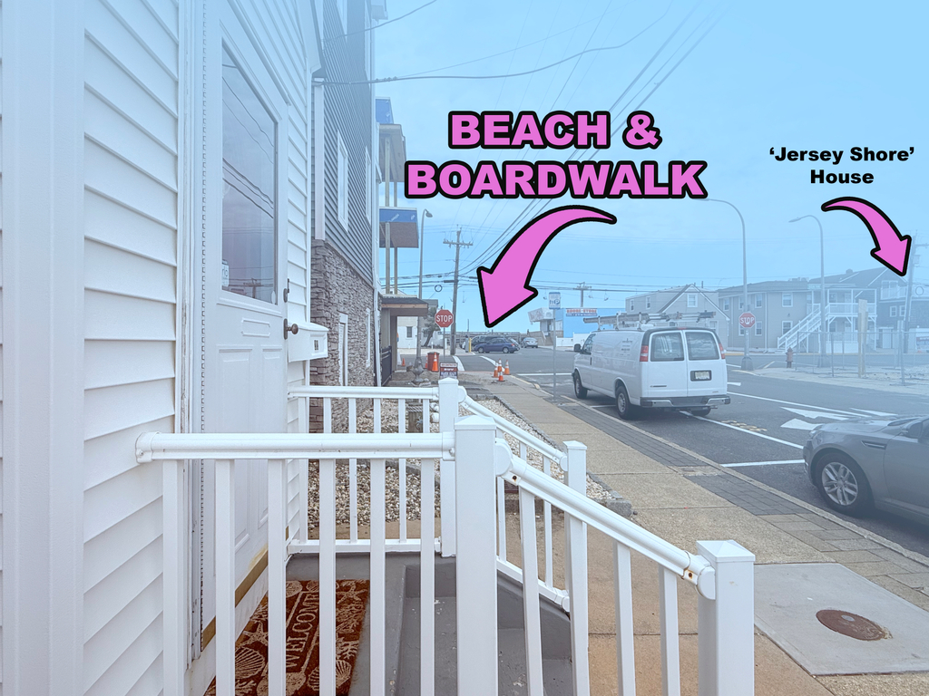 Beach and boardwalk can be seen from cottage porch.