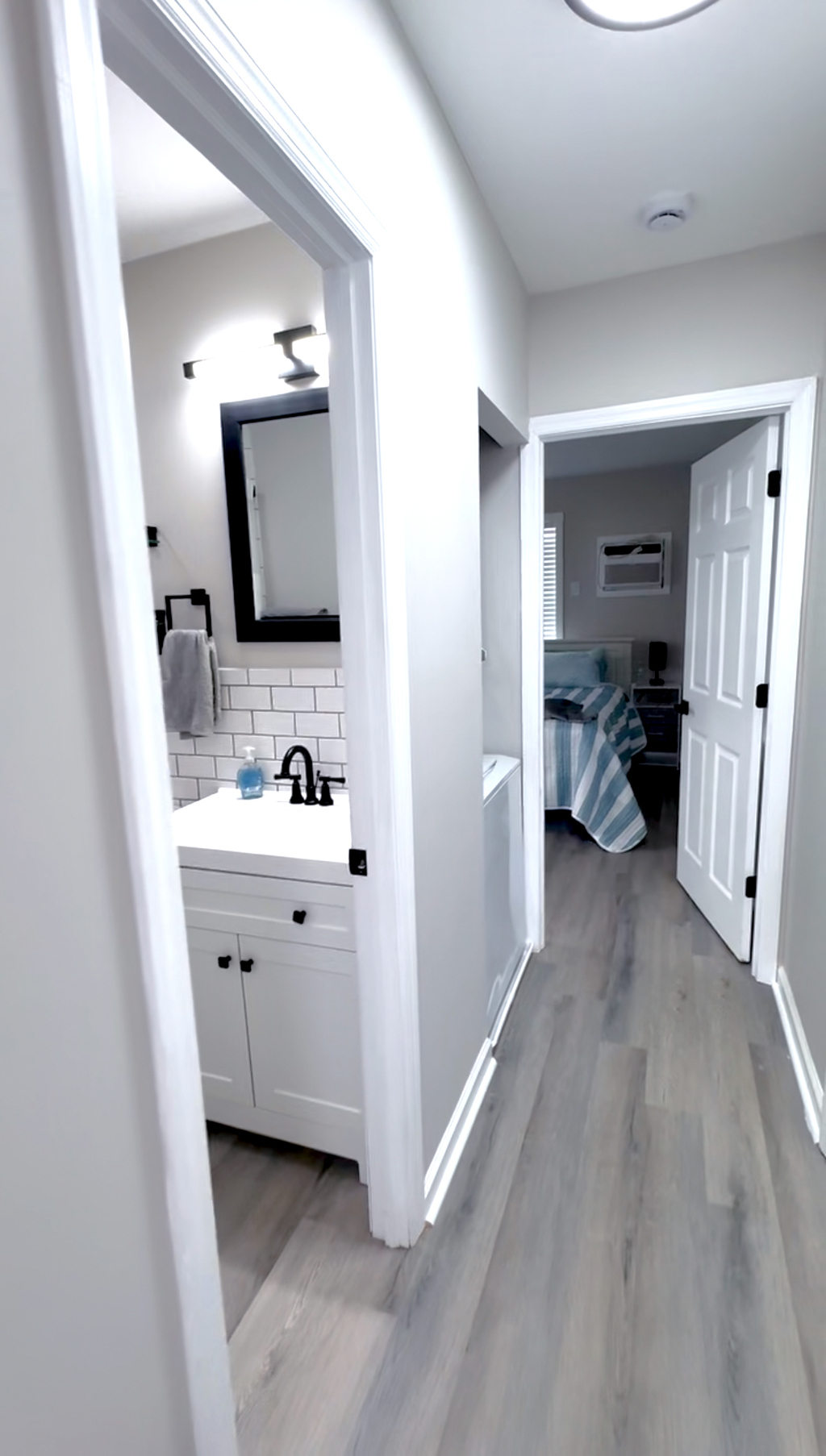 long hallway features door to sideyard.