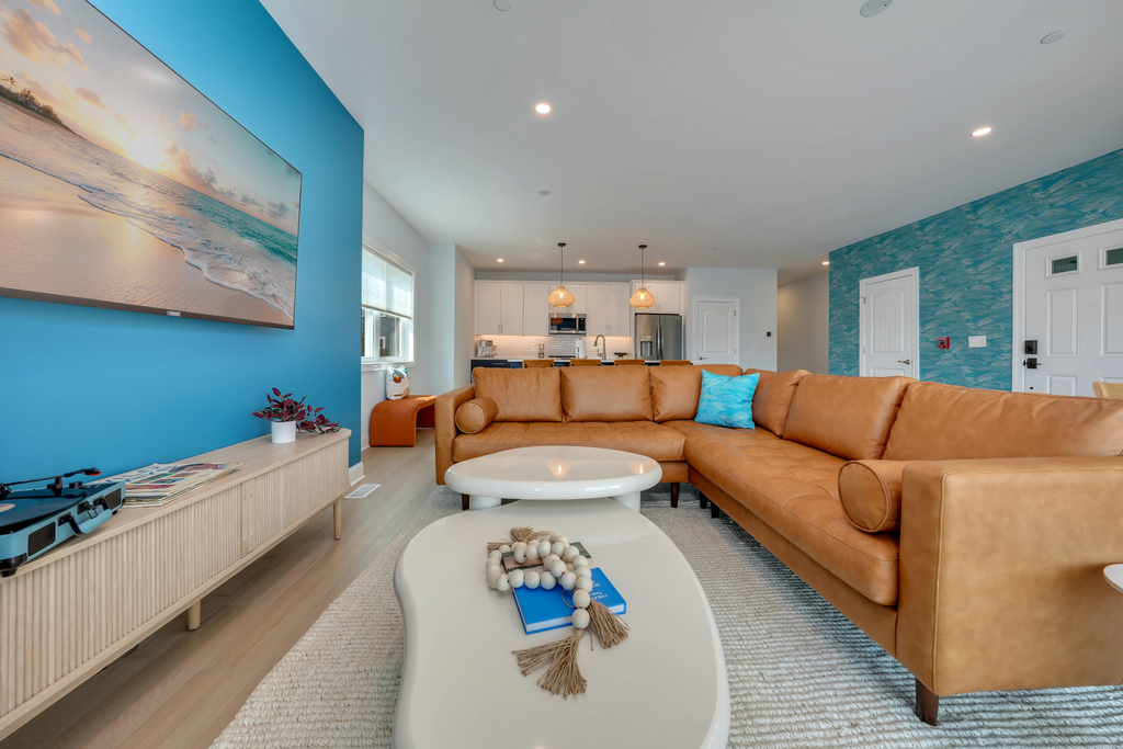Living Room with Leather Sectional and Game-Ready Coffee Table