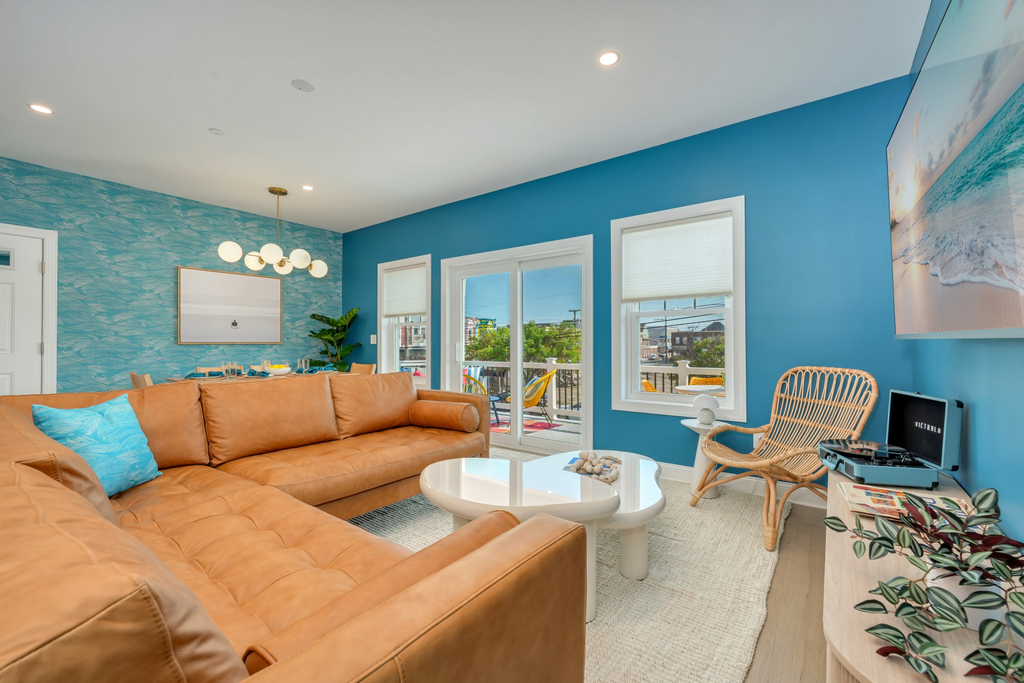 Living Room with Leather Sectional and Game-Ready Coffee Table