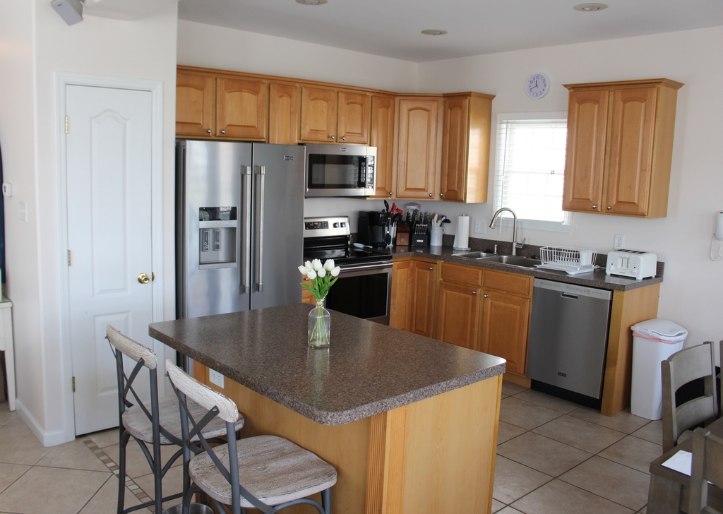 Kitchen with island bar stools