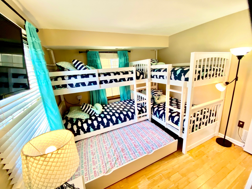 bedroom #3, 4 twin bunks, plus twin trundle (across from master)