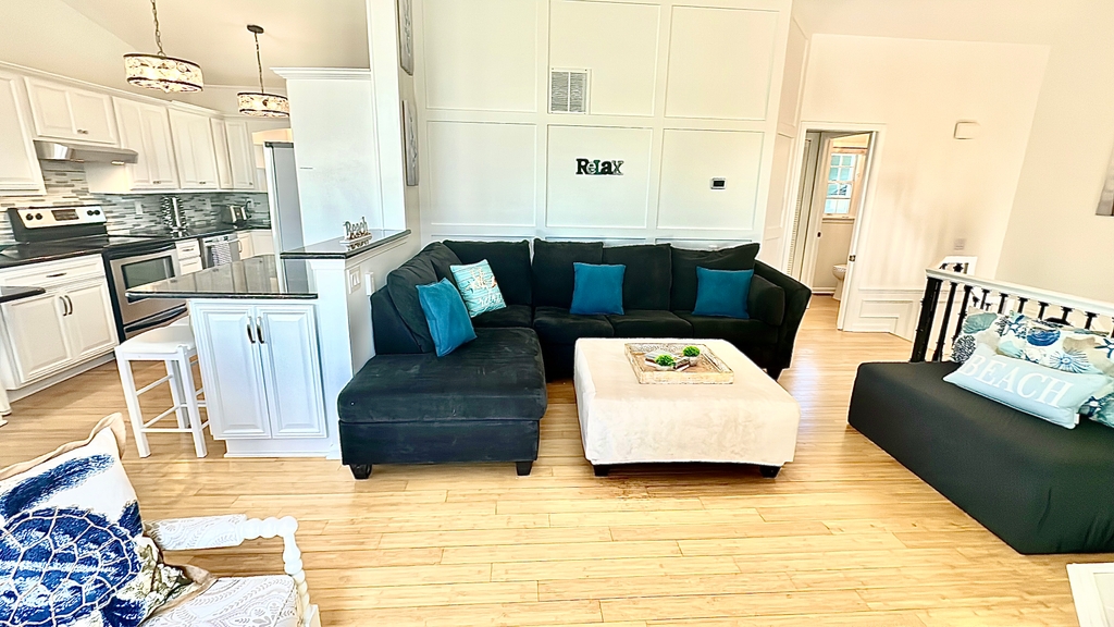 open concept living room/dining room/kitchen