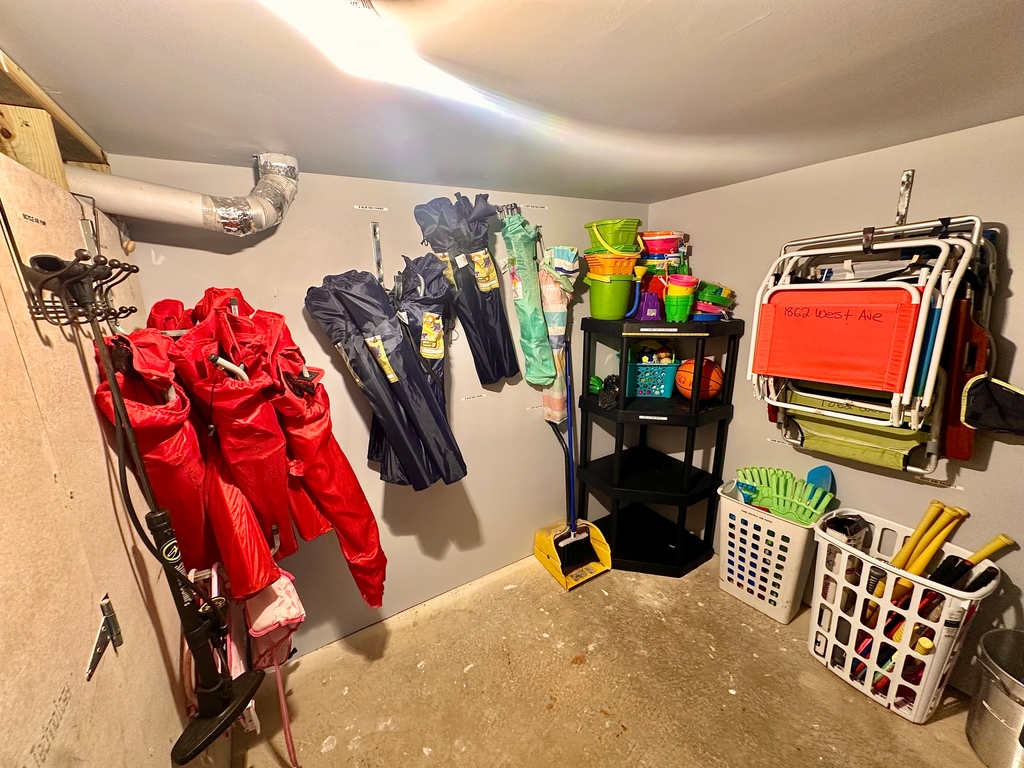 Multiple beach, chairs, sporting equipment, beach, umbrellas, all labeled and organized. New additions every year.