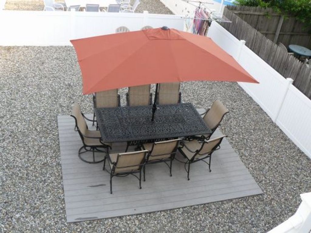 Large Backyard, Cast Aluminum Furniture, Xlarge Umbrella , BBQ Grill, Adirondack Chairs, Clothesline, Outdoor Shower