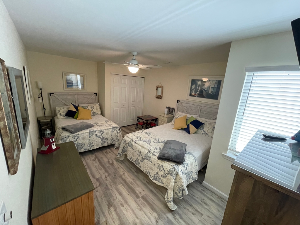 Bedroom 2, 1 queen, 1 double, large closet, flat screen, room to move, plus pack n play in closet 