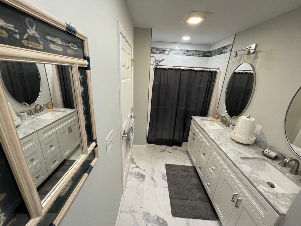 New Master bath, walk in shower with seat, large double vanity, linen closet 