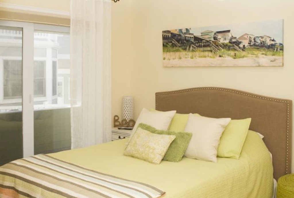 1st floor guest bedroom #3....spacious room, opens directly onto covered oveanfront porch