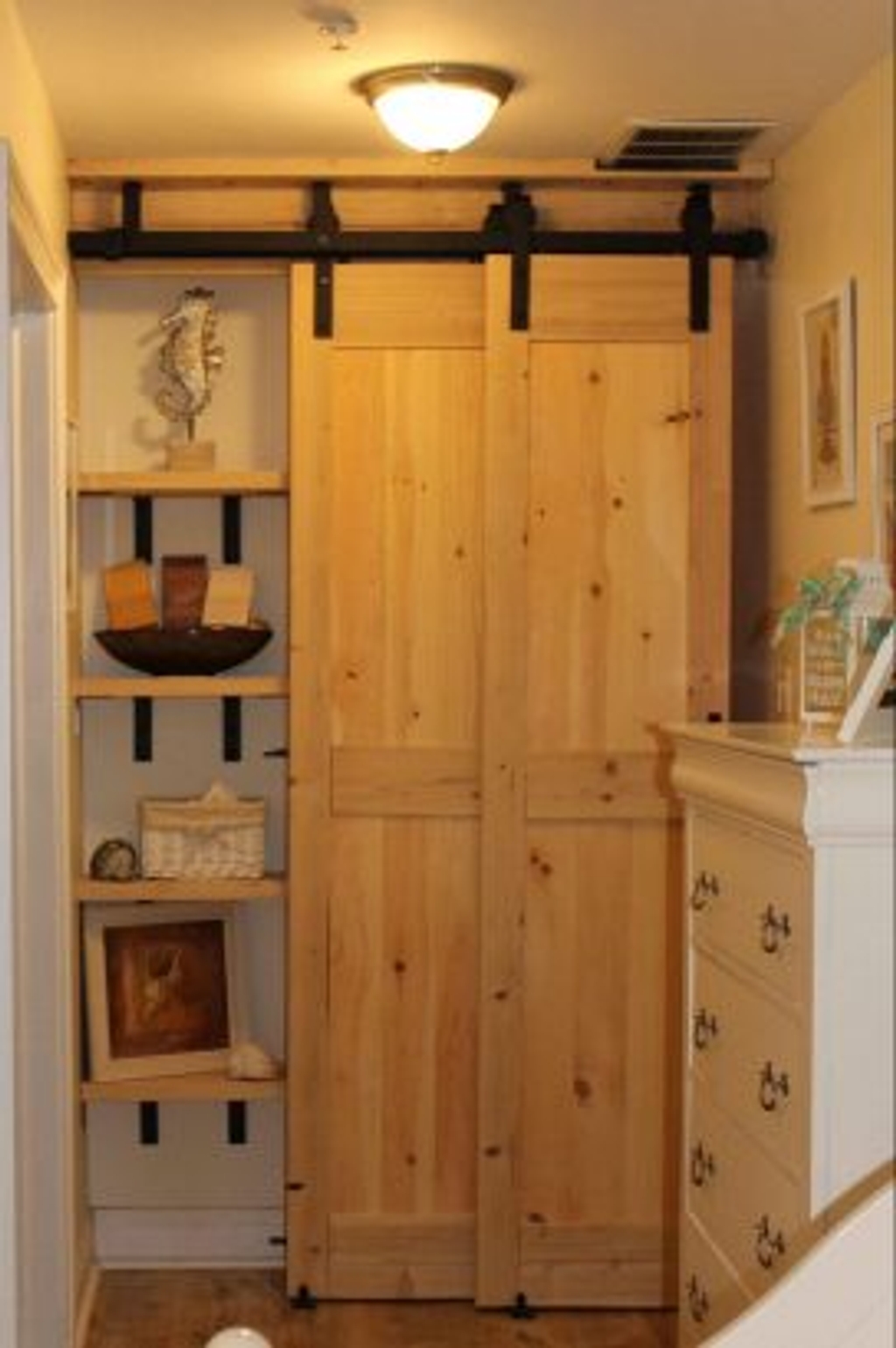 Barn doors closed for privacy.