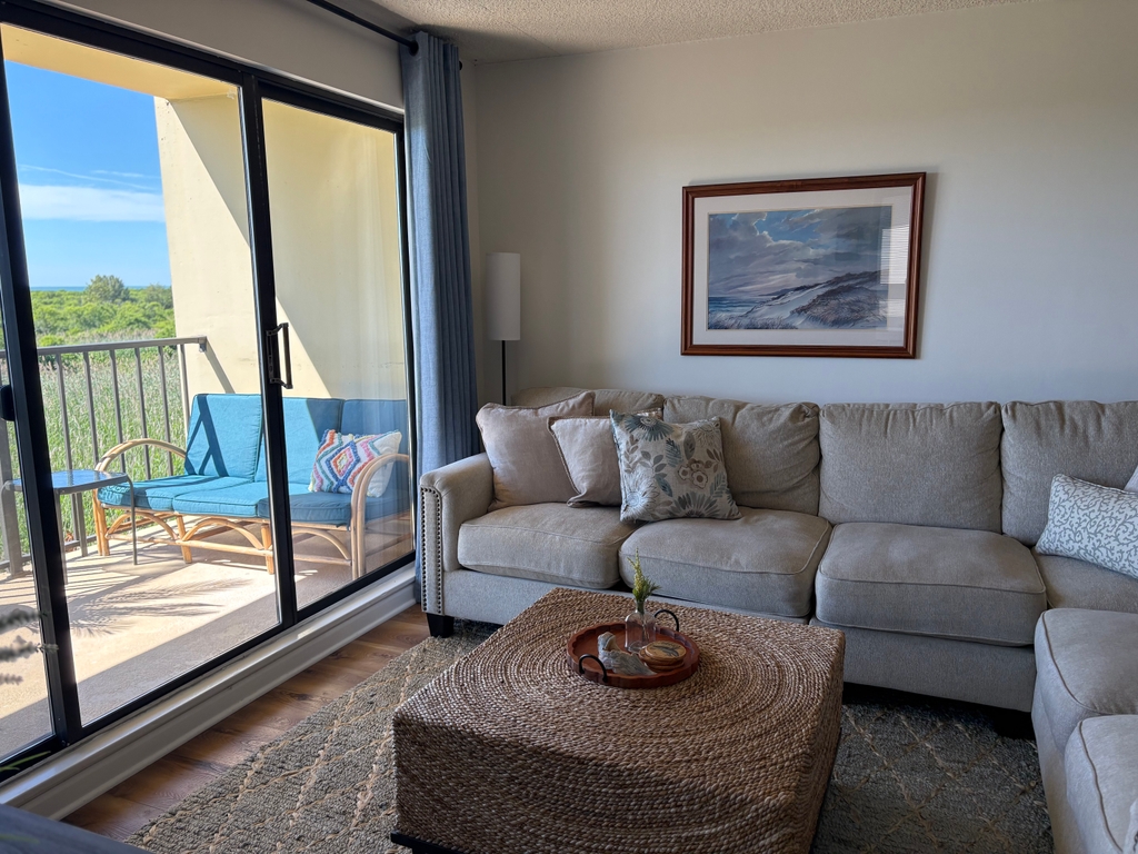 living room with sliders to balcony