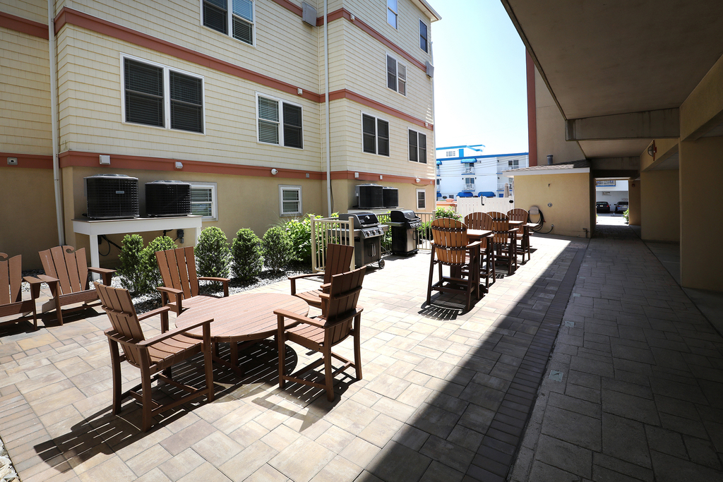 Grilling area outside of pool entrance 