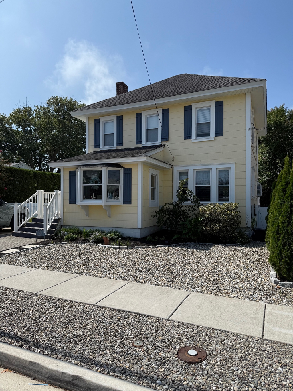 Front Main House w/ sidewalk to town! 
