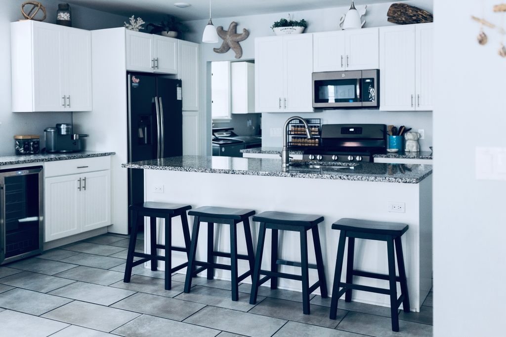 Fully Stocked Kitchen with Stainless Steel Appliances