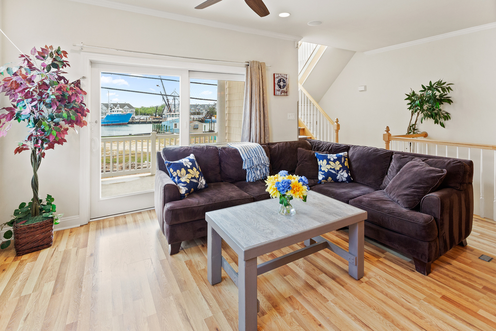 ❤️ Enjoy the fun living room area! A Great Place for you to gather with friends and family! Enjoy water views and the fresh sea air from the Large Outside Deck! A 65&amp;rdquo; 4K TV with Free HBO, Sports Channels, and lots of channels are available!