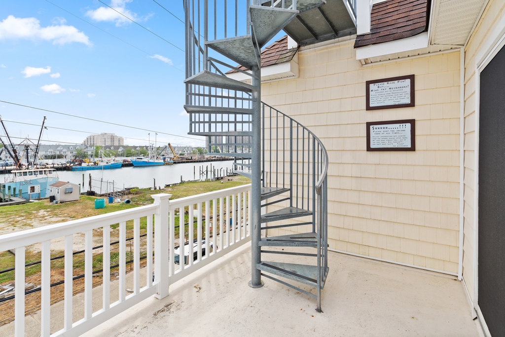 ❤️ Amazing Deck right outside of the Master Bedroom. Unique and beautiful spiral staircase that takes you up to the One-of-A-Kind Rooftop Deck with amazing views to experience! 
