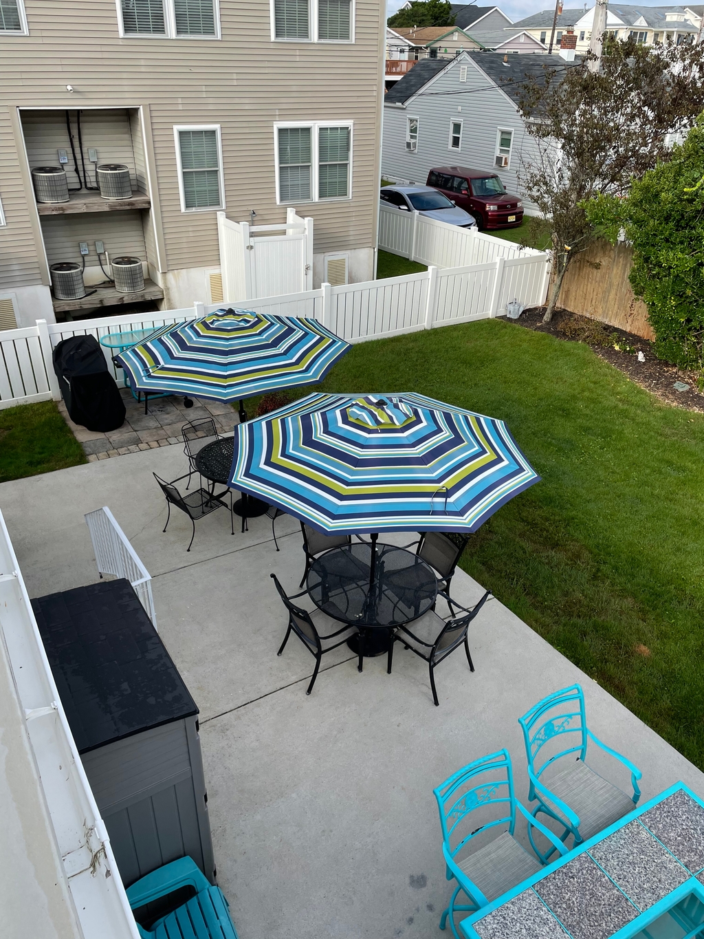  view of patio from balcony with gas grill