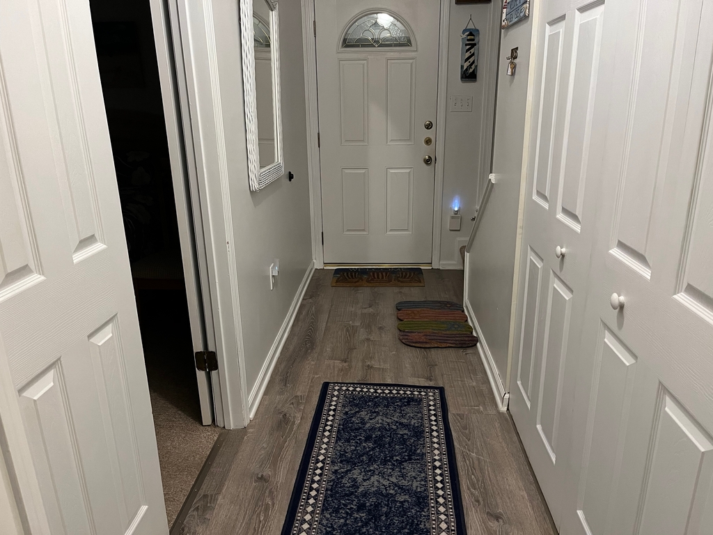 Hallway w/new LVP + WD Closet