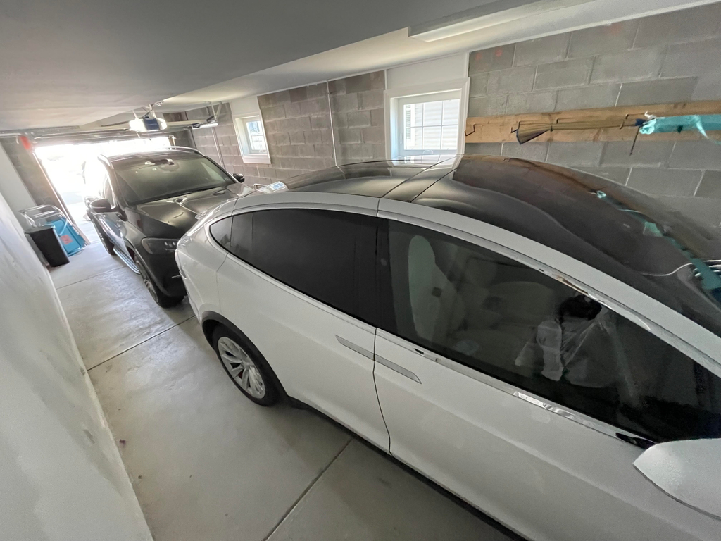 Two car garage can fit SUVs