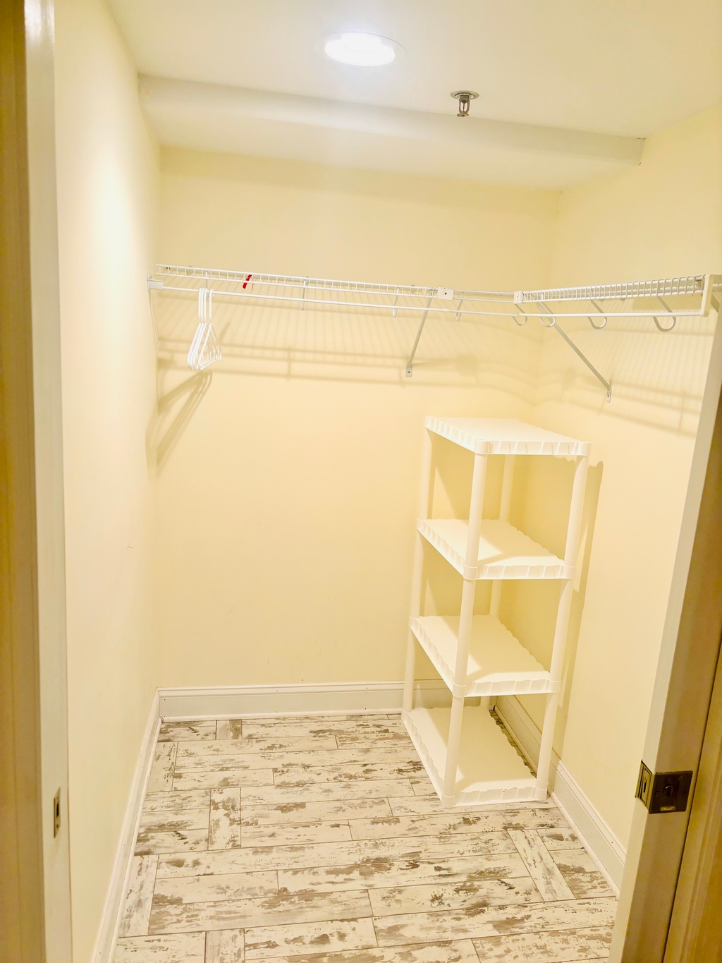 Large walk in closet in master bedroom 