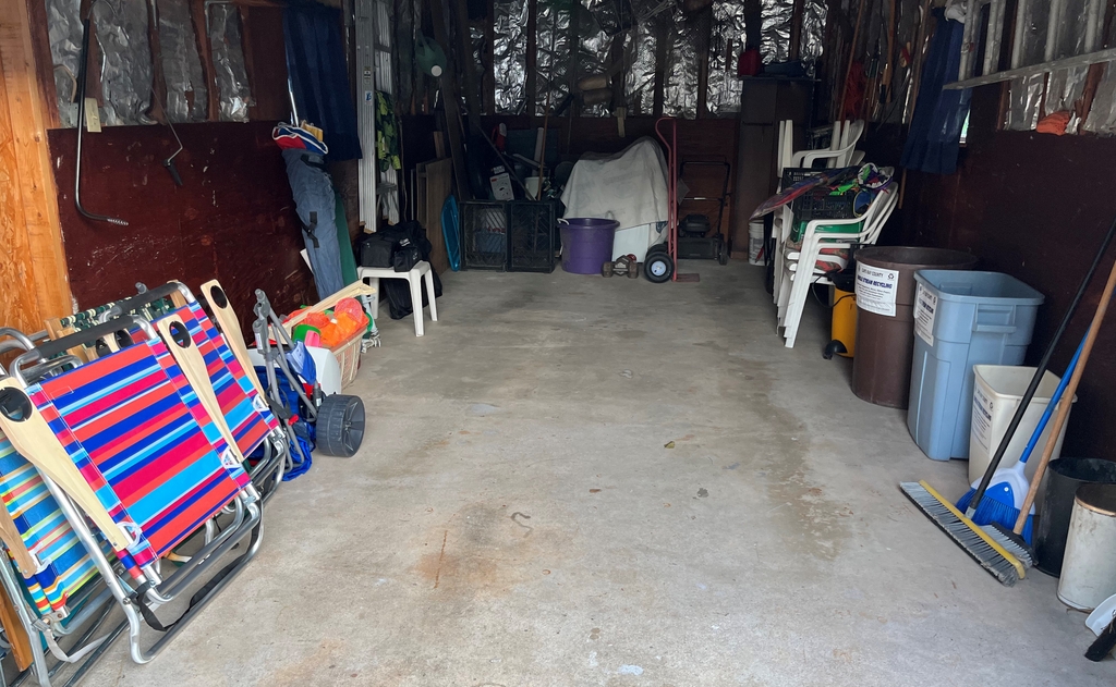 Chairs, beach toys, beach caddy, cooler, umbellas and games all stored in garage, and lots of room for your own stuff