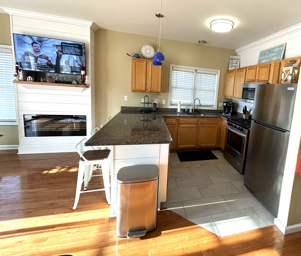 K - new tile, appliances, lights. Shiplap island