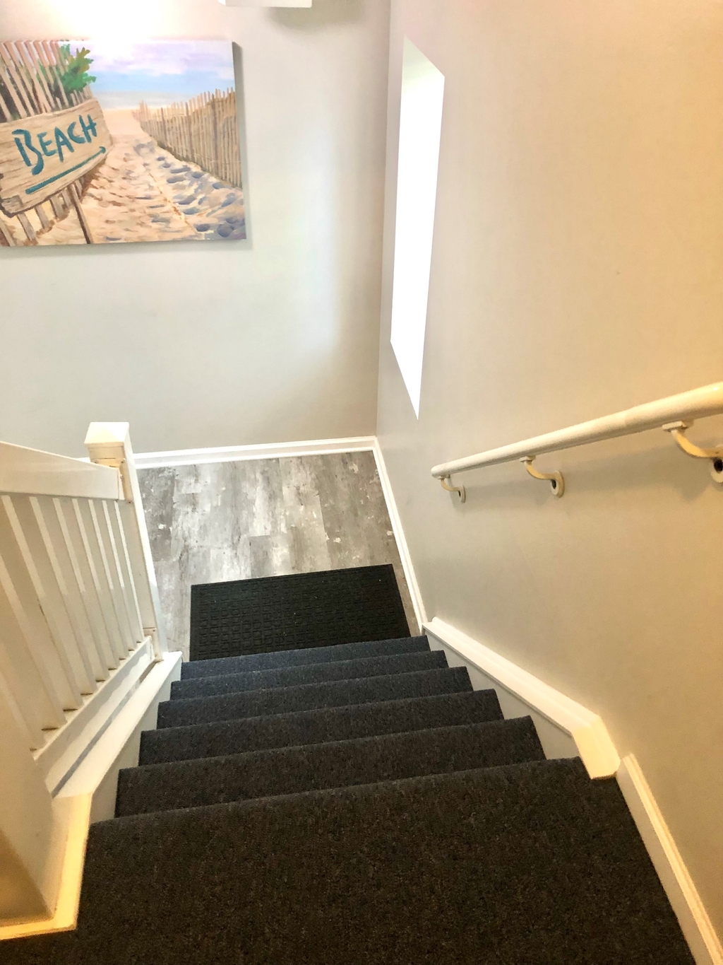 Stairs from landing to ground level - new vinyl flooring