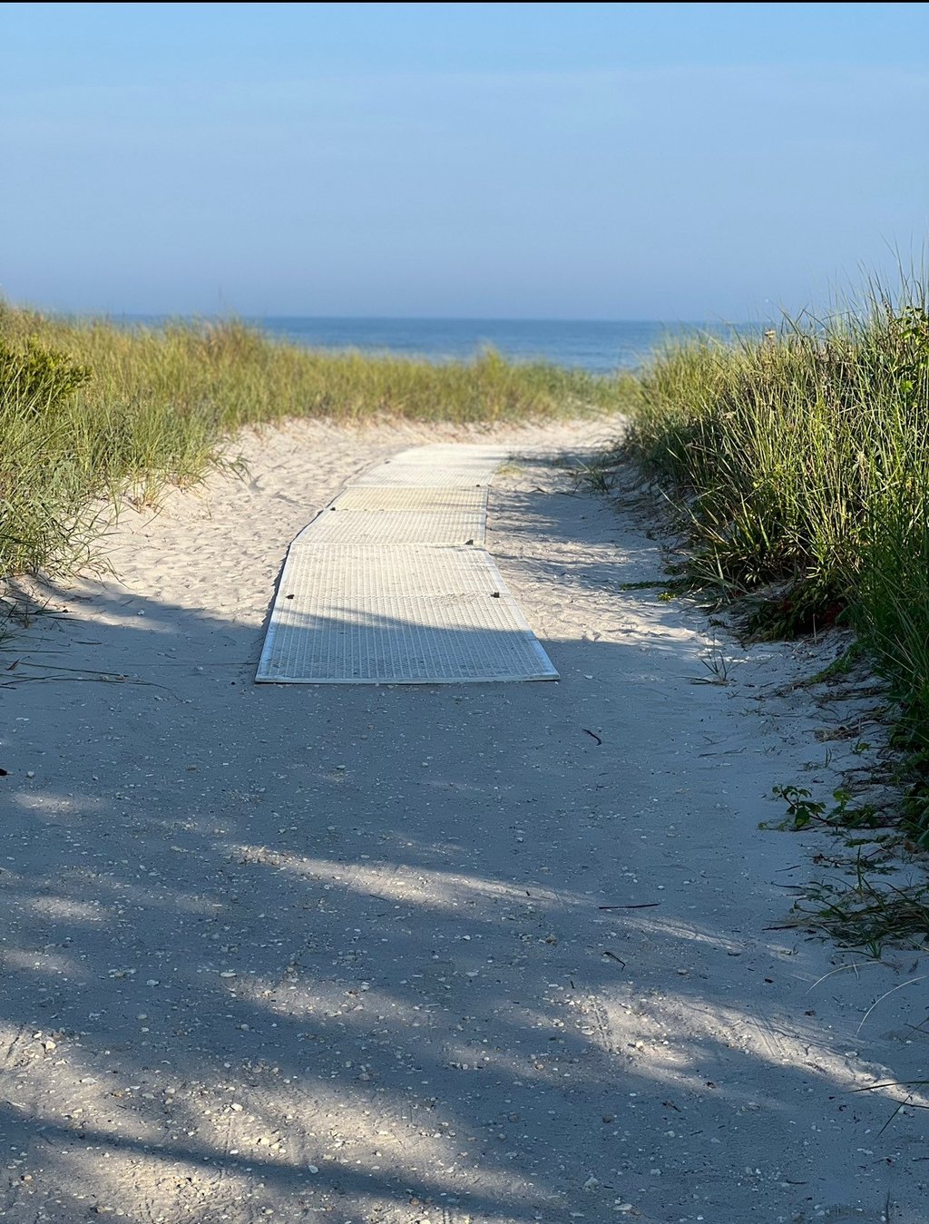 Beach entrance at 7th St, less than 2 min walk with lifeguards