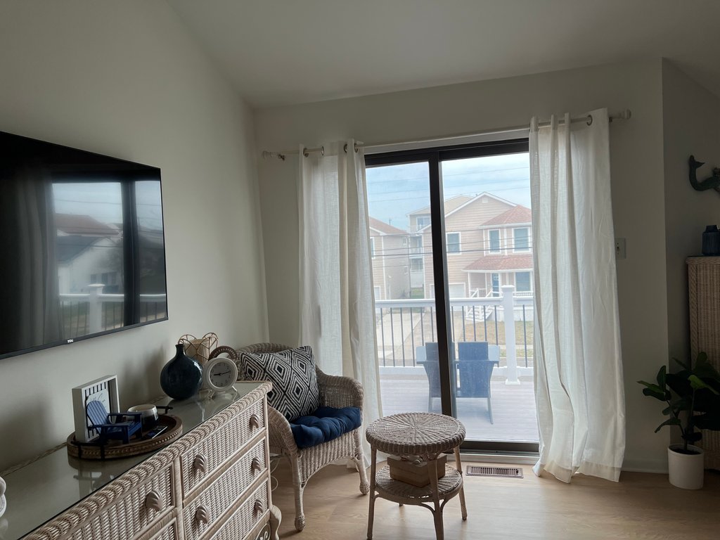 Master bedroom with upper deck off bedroom